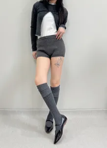 Japanese style grey knit over-the-knee socks and matching outfit detail view, cozy winter look.
