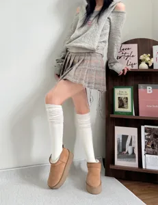 Autumn winter slouchy over the knee white cotton wide striped stackable calf socks for women.