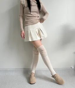 Detailed view of cozy knit over-the-knee thigh high socks, soft texture and stylish fit.