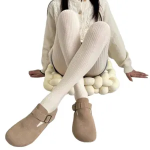 Vintage cable knit pantyhose for women, cozy winter tights with comfortable heel.