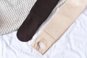 Fleece-lined thermal stirrup tights, thick winter warm leggings in coffee and beige colors.