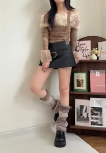 Gradient knit leg warmers detail view, cozy winter fuzzy cuffs style for women.