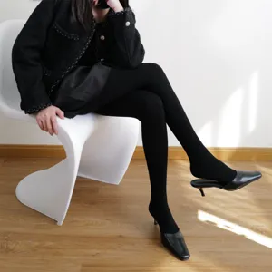 Black ribbed tights for women, stretchy winter leggings, classic vintage knit hosiery basic.