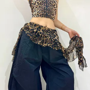 Close-up detail of the stylish leopard print hip scarf and crop top outfit for street dance.