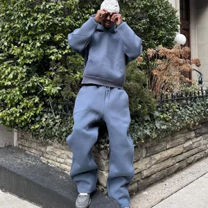 Oversized grey hoodie and sweatpants set, comfortable streetwear couple outfit for daily.