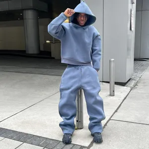 Casual minimalist solid color oversized hoodie and sweatpants set for fashion street wear.