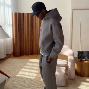 Detailed view of the casual solid loose hoodie and sweatpants set, showing fabric texture.