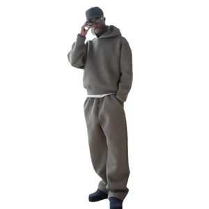 Solid color loose hoodie and sweatpants set, casual couple streetwear fashion outfit.