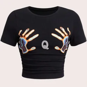 Schwarzes Crop-Top, kurze Ärmel, Rundhalsausschnitt, cooler Handabdruck mit Strass Q.