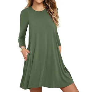 Solid color long sleeve pocket dress detail shot, featuring a casual A-line style.