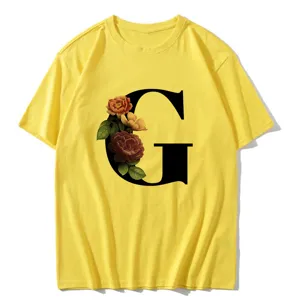Yellow short-sleeve T-shirt featuring a stylish black letter G and vintage floral print design.