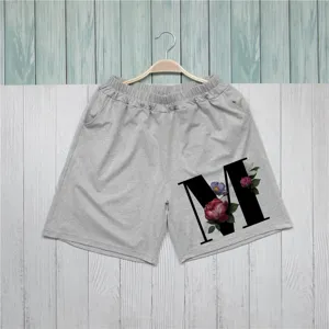 Γυναικείο casual γκρι σορτς με floral γράμμα M τύπωμα και άνετη ελαστική μέση.