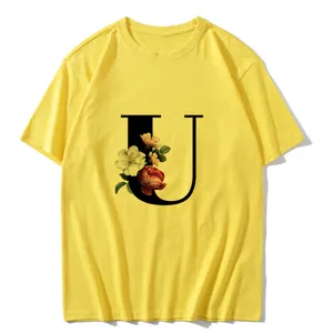 Yellow short sleeve t-shirt with floral letter U print, casual summer women top wear.