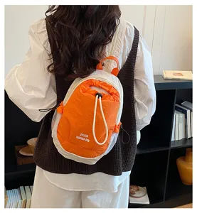 Stylish casual small nylon backpack with contrast color drawstring and side mesh pockets for daily.