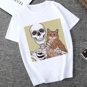 Close-up detail of white short sleeve t-shirt featuring skeleton and cat graphic print design.