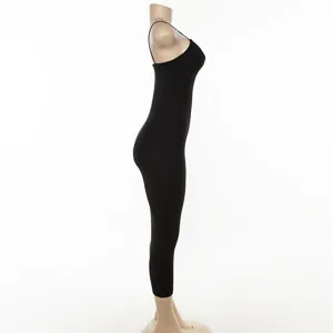 Side view detail of black spaghetti strap bodycon dress, sleek fitted silhouette.