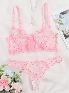 Schnittiges transparentes Damen Lingerie Set aus zarter Spitze mit rosa Herzen und gutem Sitz.