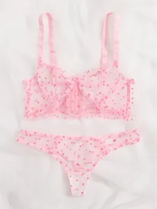 Rosa transparente Spitzen-Lingerie-Set mit Herz-Print, sexy BH und Tanga-Details.