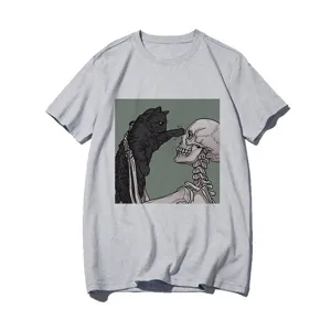Close-up view of the unique cat and skeleton graphic print on grey t-shirt apparel detail.