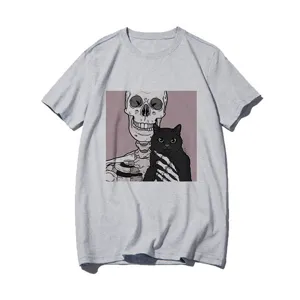 Close-up detail of the graphic print showing a skeleton holding a black cat on grey fabric.
