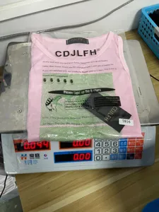 Pink sleeveless tank top for women, casual summer top with printed graphic and brand logo.