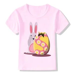 Pink kids summer short sleeve t-shirt detail featuring cute cartoon Easter bunny graphic print.