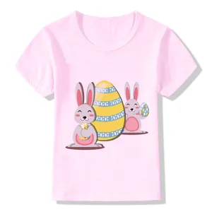 Pink kids short sleeve t-shirt featuring cute Easter bunny and colorful egg print design.