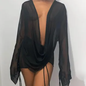 Women sheer mesh deep V-neck cowl neck long sleeve drawstring two-piece set detail.