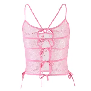 Pink lace camisole top featuring sheer jacquard pattern, delicate bow ties and slim straps.