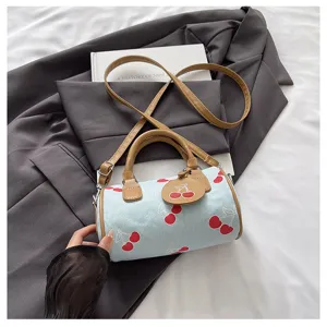 Cute denim cherry print barrel bag, stylish shoulder crossbody handbag for women daily use.