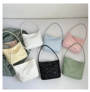 Star print shoulder bag for women, stylish underarm bag, casual daily handbag, multiple colors.