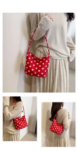 Red white polka dot shoulder underarm bag detail view, chic daily casual fashion tote style.