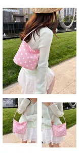 Pink polka dot underarm shoulder bag for women, cute casual daily handbag for outdoor travel.