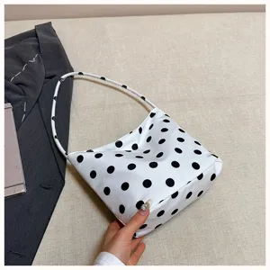 Chic white polka dot shoulder bag for women, stylish underarm bag for daily commute and casual use.