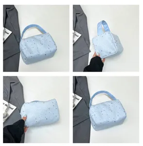 Light blue star print tote bag, casual handbag and lunch bag for daily commute and outdoor use.