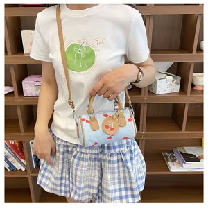 Cute denim printed barrel bag for women, stylish cherry shoulder and crossbody handbag.
