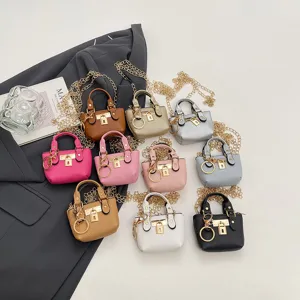 Modische süße Mini Umhängetasche für Mädchen, stilvolle Kinder Handtasche mit Kette Schloss.