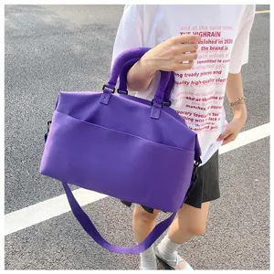 Detailed view of the large capacity purple duffel yoga gym travel shoulder bag for daily use.
