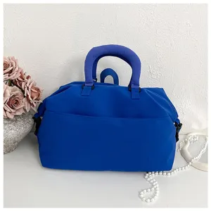Blue thickened yoga fitness bag detail view, large capacity travel duffel bag with dual handles.