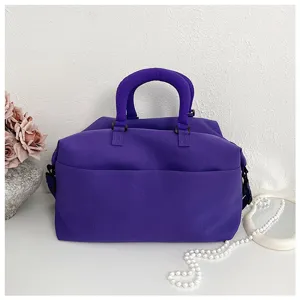 Purple thick yoga fitness bag large capacity travel duffel bag for sports training and gym use.