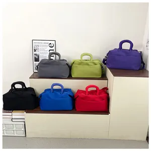 Detailed view of large capacity thick yoga fitness gym duffel travel bag in various solid colors.