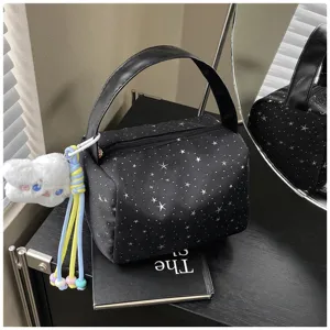 Black star pattern handbag lunch bag with cute plush cloud charm for daily commute and casual use.