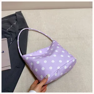 Purple polka dot shoulder bag, casual trendy underarm bag for daily wear and commuting.