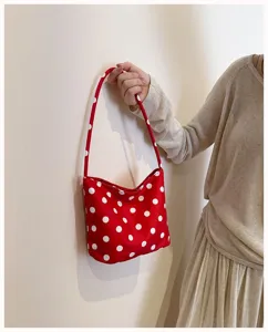 Red polka dot shoulder bag for women, casual cute underarm bag, trendy daily retro handbag.