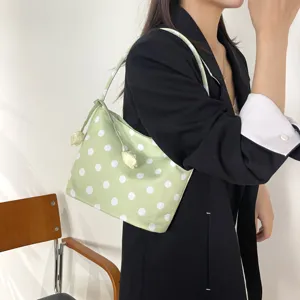 Chic light green polka dot shoulder bag, stylish underarm bag for daily wear and commuting.