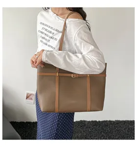 Detailed view of the stylish large capacity women shoulder tote bag with elegant brown design.