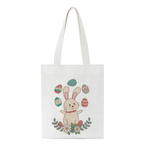 Gedetailleerd close-upoverzicht van de paashaas grafische print op de witte canvas tas.