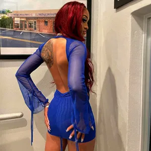 Blue mesh long sleeve backless dress detail view, sheer fabric with string tie cuffs sexy clubwear.