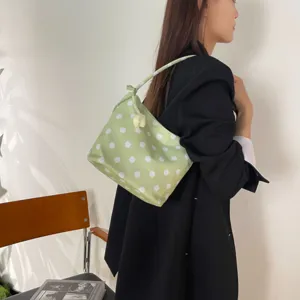 Chic light green polka dot shoulder bag, versatile underarm handbag for daily commuting women.