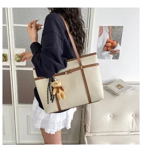 Stylish large capacity tote bag for women, chic two-tone shoulder bag for daily casual commute.